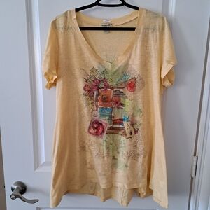 Long tunic T-shirt size 1X. Floral with beading.
